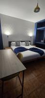 A bed or beds in a room at Hostal Baleàric