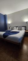 A bed or beds in a room at Hostal Baleàric