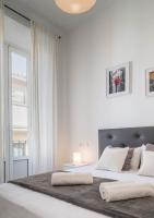 A bed or beds in a room at Apartamentos Alcazaba