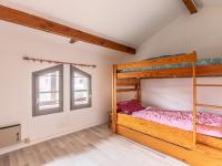 Łóżko lub łóżka w pokoju w obiekcie Maison T2 avec Mezzanine, Terrasse et Parking à 300m de la Plage - Biscarrosse - FR-1-521-214