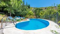 Bazén v ubytování Cortijo Benamayor Torrox by Ruralidays nebo v jeho okolí