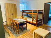 Postel nebo postele na pokoji v ubytování Apartmány v ráji (Českém)