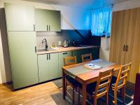 Kuchyň nebo kuchyňský kout v ubytování Apartmány v ráji (Českém)