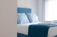 Postel nebo postele na pokoji v ubytování Orange Boutique Residence - Casa Luis Camões
