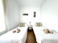 Posteľ alebo postele v izbe v ubytovaní Mirador de Doñana Nº 14, Apartamentos Living Sur