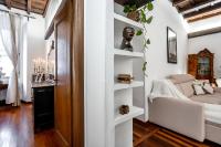 A bed or beds in a room at Trevi Fountain Luxury Guest House
