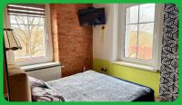 Posteľ alebo postele v izbe v ubytovaní Apartament u Kasi
