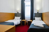 Hotel Poniatowskiにあるベッド