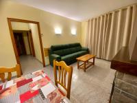Posezení v ubytování Apartaments Castellar de n'Hug
