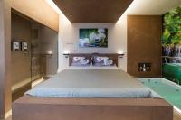 A bed or beds in a room at Luxury Suite