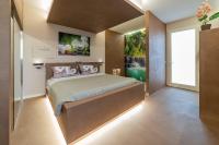 A bed or beds in a room at Luxury Suite