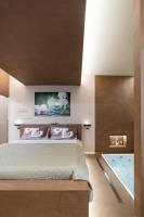 A bed or beds in a room at Luxury Suite