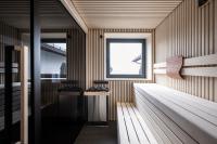A bed or beds in a room at Hotel Belvedere - Fine Dining, Hideaway & SPA