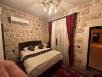 Postel nebo postele na pokoji v ubytování Sikeft Otel