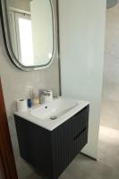 A bathroom at Marie Hotel