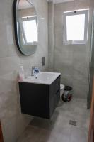 A bathroom at Marie Hotel