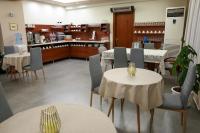 A restaurant or other place to eat at Marie Hotel