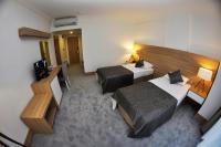 Postel nebo postele na pokoji v ubytování Ozyigit Otel