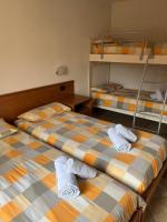 Posteľ alebo postele v izbe v ubytovaní Mountain Home - Families Holidays