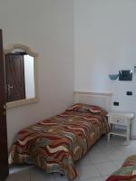 Posteľ alebo postele v izbe v ubytovaní Scano Comfort Inn