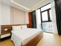 K&T Hotel Sân Bay TSN-150m từ Nhà Ga T3にあるベッド