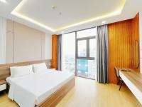 K&T Hotel Sân Bay TSN-150m từ Nhà Ga T3にあるベッド