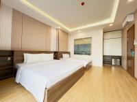 K&T Hotel Sân Bay TSN-150m từ Nhà Ga T3にあるベッド