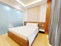 K&T Hotel Sân Bay TSN-150m từ Nhà Ga T3にあるベッド