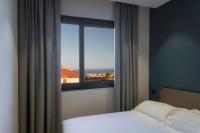 Posteľ alebo postele v izbe v ubytovaní Ollen apartments