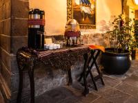 a table in a room with a table with aoodoo at Novotel Cusco in Cusco
