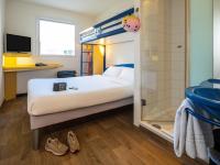Posteľ alebo postele v izbe v ubytovaní Ibis Budget Graz City