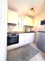 Kuchyň nebo kuchyňský kout v ubytování Apartman Fani