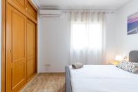A bed or beds in a room at La Kaye