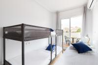 A bed or beds in a room at La Kaye