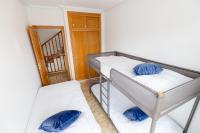 A bed or beds in a room at La Kaye