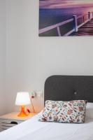 A bed or beds in a room at La Kaye