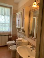 Kúpeľňa v ubytovaní Maison Renée Viareggio
