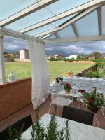 Balkón alebo terasa v ubytovaní Maison Renée Viareggio