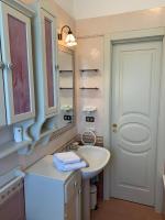 Kúpeľňa v ubytovaní Maison Renée Viareggio