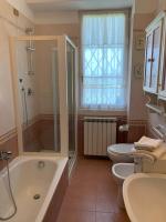Kúpeľňa v ubytovaní Maison Renée Viareggio