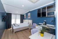 A bed or beds in a room at Taksim Trend Residence
