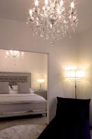 Postel nebo postele na pokoji v ubytování Milford Suites Budapest