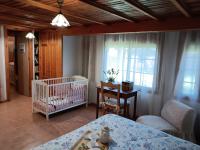 Postel nebo postele na pokoji v ubytování Casa La Maestra