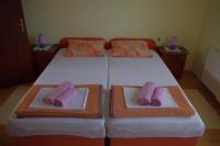 Postel nebo postele na pokoji v ubytování Apartment Tomy