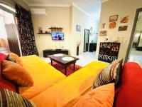 TV a/nebo společenská místnost v ubytování Desert Pearl Apartment