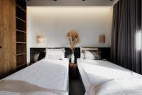 Postel nebo postele na pokoji v ubytování Suite Homes - Fine Living , Preveza
