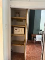 a microwave on a shelf in a room at Lower Price, More Style, Discount Studio In San Juan,Pr, Beach, Free Bikes in San Juan