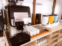 Příslušenství pro přípravu čaje a kávy v ubytování Champion Hotel