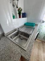 Kuchyň nebo kuchyňský kout v ubytování Lindo y acogedor Apartamento Grao Playa Gandia piso 5to sin ascensor