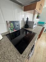 Kuchyň nebo kuchyňský kout v ubytování Lindo y acogedor Apartamento Grao Playa Gandia piso 5to sin ascensor